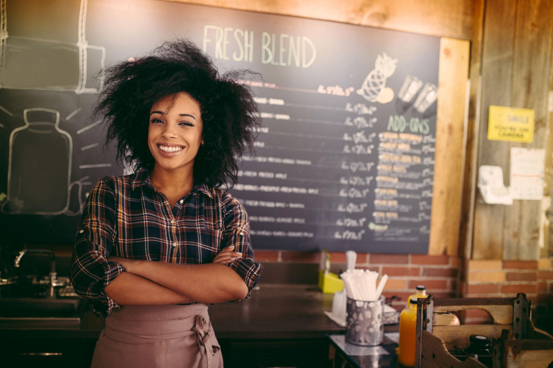 Business owner on phone reviewing AI insights